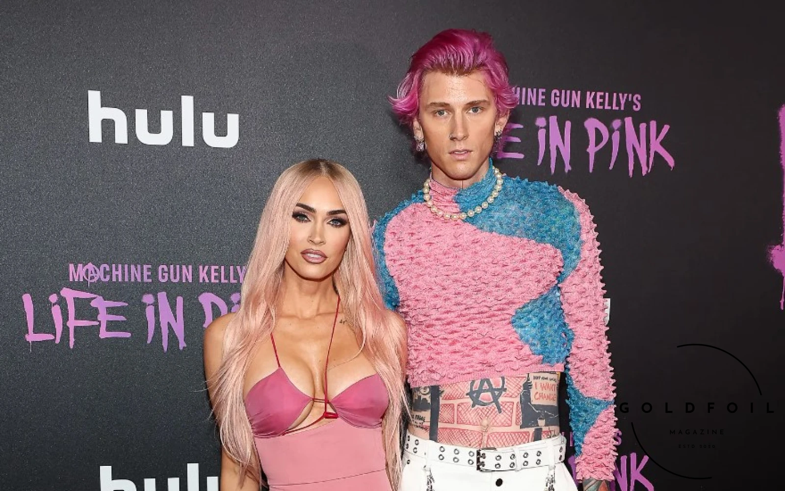 Machine Gun kelly and Megan Fox wearing an all Barbie inspired look to the MGK Hulu premiere Machine Gun kelly and Megan Fox wearing an all Barbie inspired look to the MGK Hulu premiere